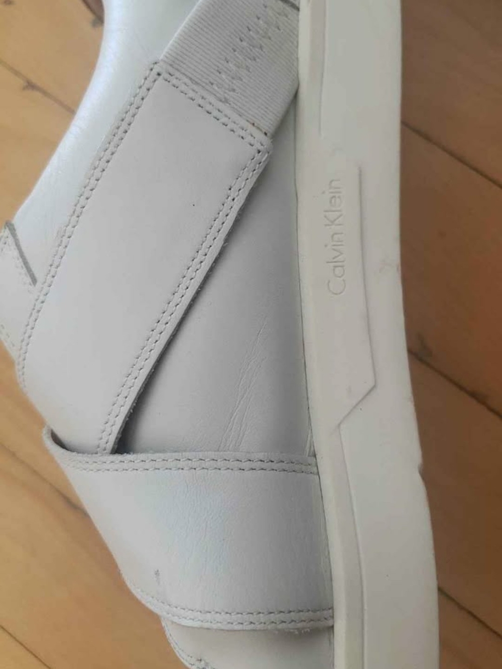 Calvin Klein All-White Leather Slip-On Sneaker